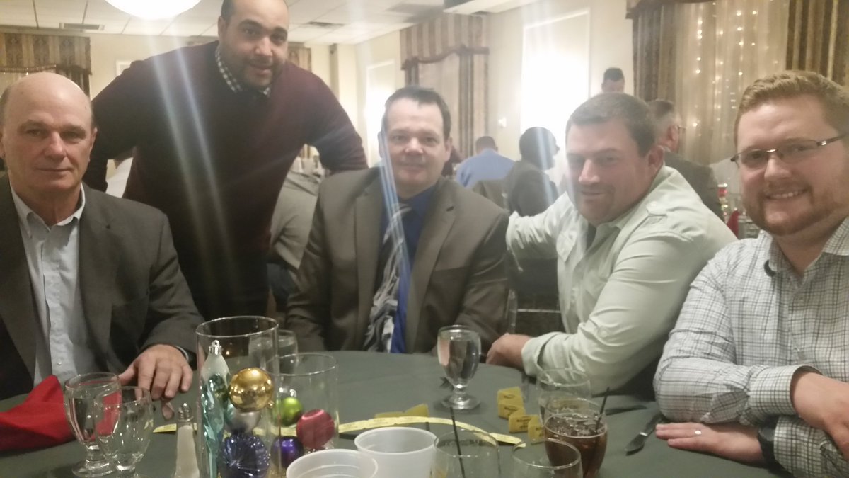 Football coaches being  honored fir sportsmanship award from south jersey officials association