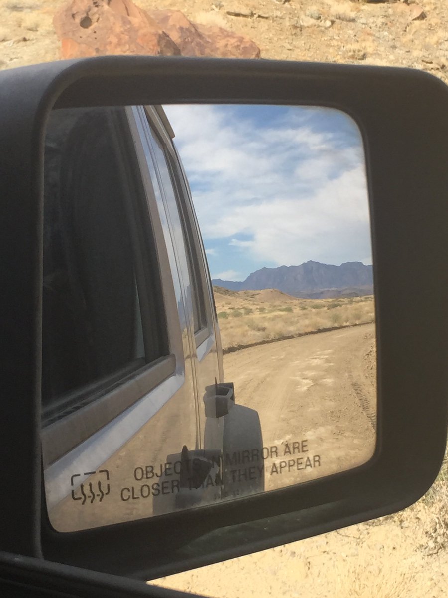 neelbaum's tweet photo. Chisos in the rear view. #tx16in16 #FindYourPark #NPS100 #bigbend #objectsinmirrorarecloserthantheyappear https://t.co/7IBPLCYcs2