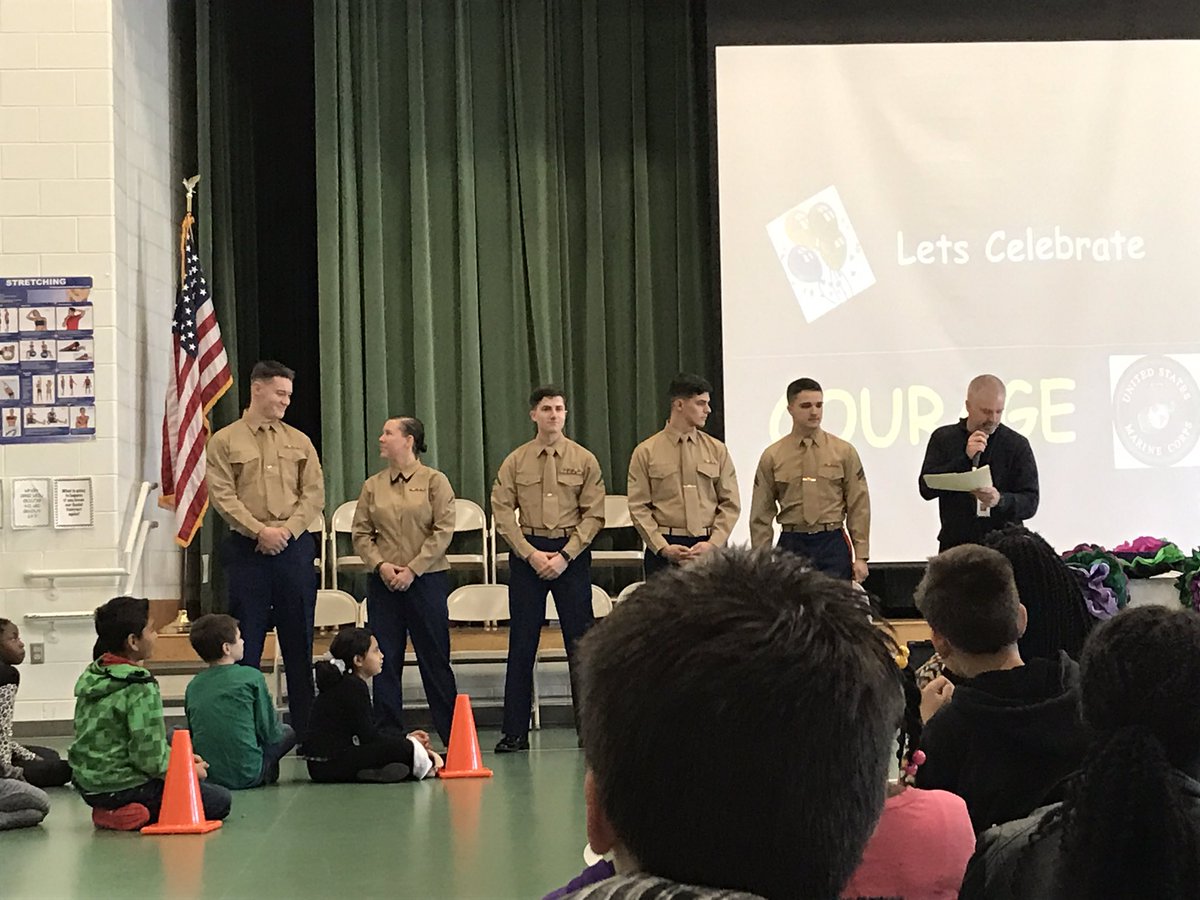 Mr. Gordon celebrating COURAGE with EGES 4-5th grades, along with the US Marines and his son! P.S. Happy birthday Mr. Gordon!
