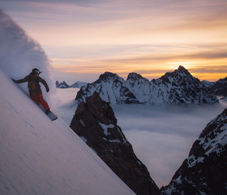 SherpasCinema's tweet photo. @RalphBackstrom high above the clouds in Greenland. This was the first time we had seen sunlight in over two weeks.@RED_Cinema @thenorthface https://t.co/uvWxAdm7MZ