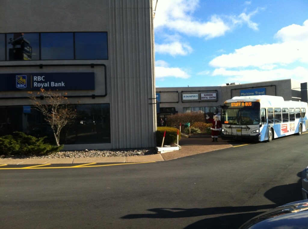 ATU508's tweet photo. Santa also stopped by @RBC_Canada in Burnside to pick up for @FEEDNOVASCOTIA #StuffaBus https://t.co/yTpnLE1Fow