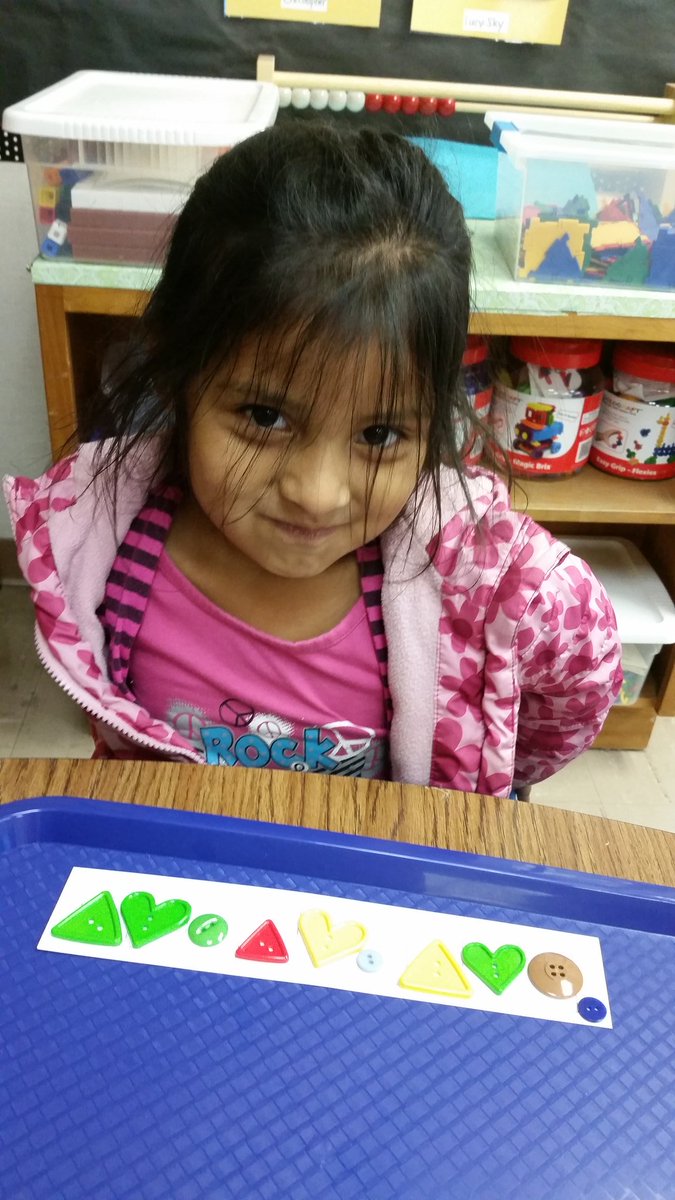 Ms_BLPerry's tweet photo. "I need a tiny button." Yaneth puts a "period" on her button pattern. #RioSchool #kindergarten #CrossDisciplinaryLearning https://t.co/htWVj5I0x4