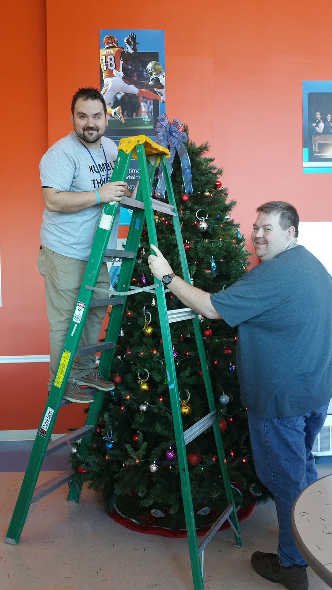 Anthony and Scottie placing the Christmas Bow atop the tree! <a href="/BartonTonyLeb/">Tony Barton</a> <a href="/ASPENCER84/">Anthony Spencer</a> @LebanonCC1