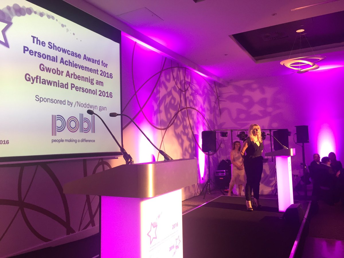 Katie_Dalton's tweet photo. .@poblgroup's @RhianStoneSolas announces the winners of the @CymorthCymru Personal Achievement Award.. Lisa Parry &amp; Rob Carpenter! #PIAs2016 https://t.co/UWHVaPr0b9