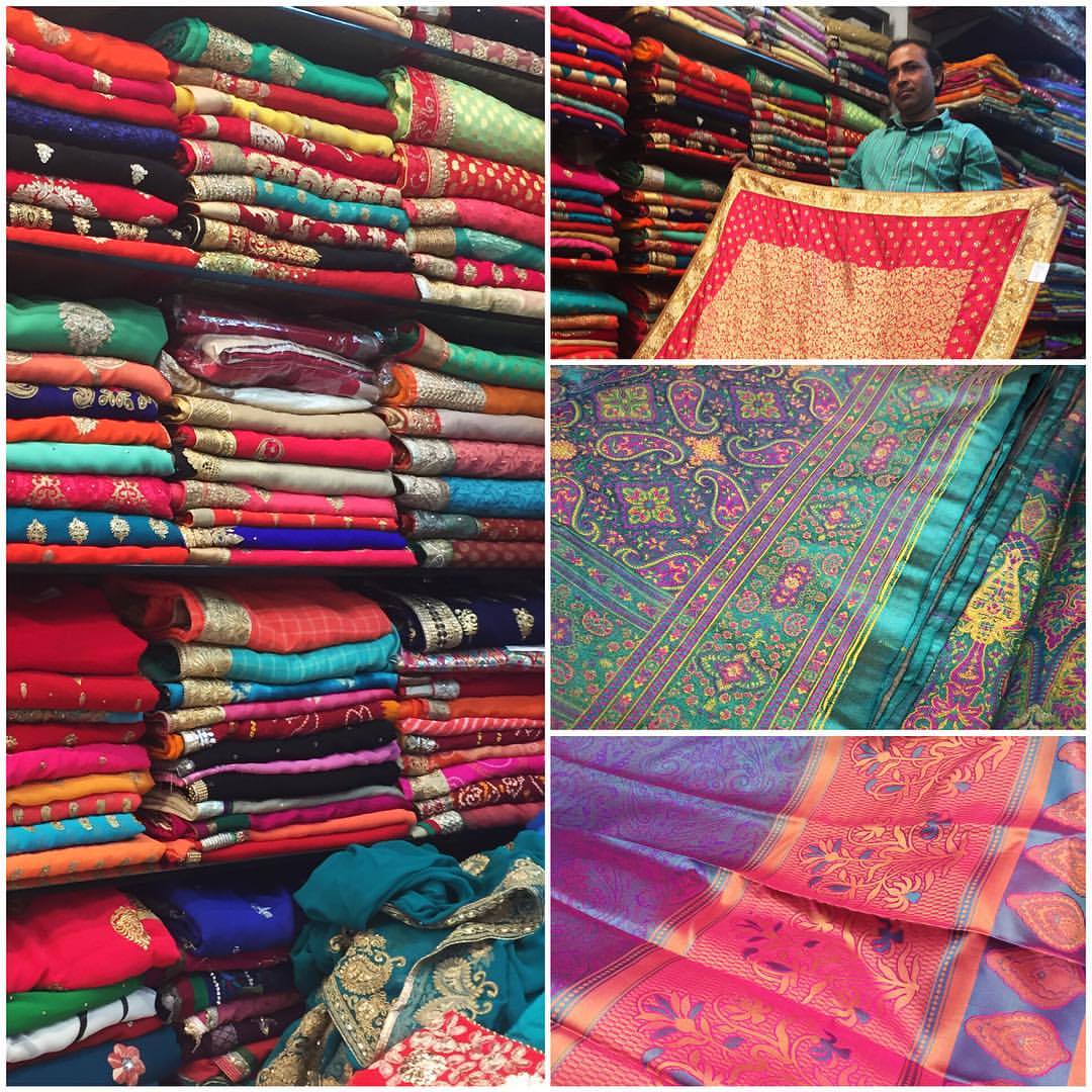 RuthMalhotra's tweet photo. Saree shopping in India at my favorite saree shop...came in to buy 2 or 3, leaving with, well, more than 2 or 3. ;) #burstsofcolor #sareefun https://t.co/2qTCa9XBbF