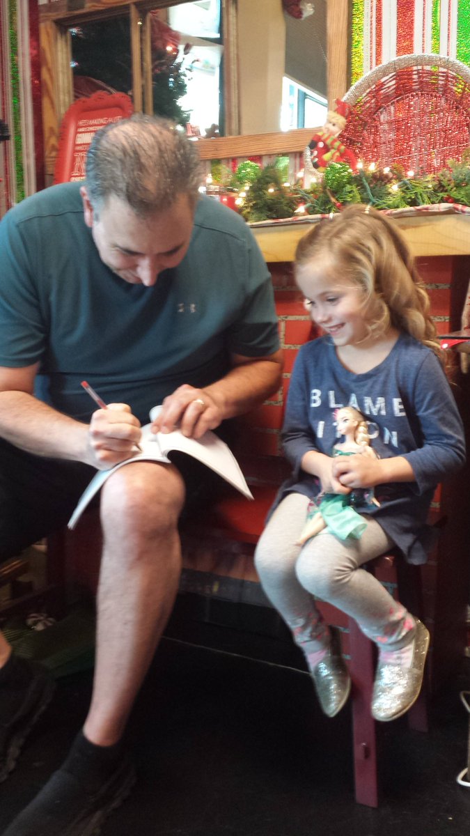 EOHIP's tweet photo. The best part of writing and publishing a Christmas book? Signing it for the children who smile just like this lovely young lady. #Amazon https://t.co/sSE9VLrya9