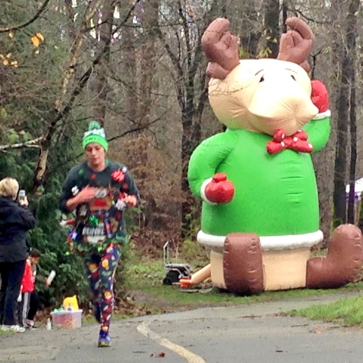 Our #GiantReindeer makes an appearance by the water &amp; hot chocolate station #uglydash #uglysweater #15YearsUgly