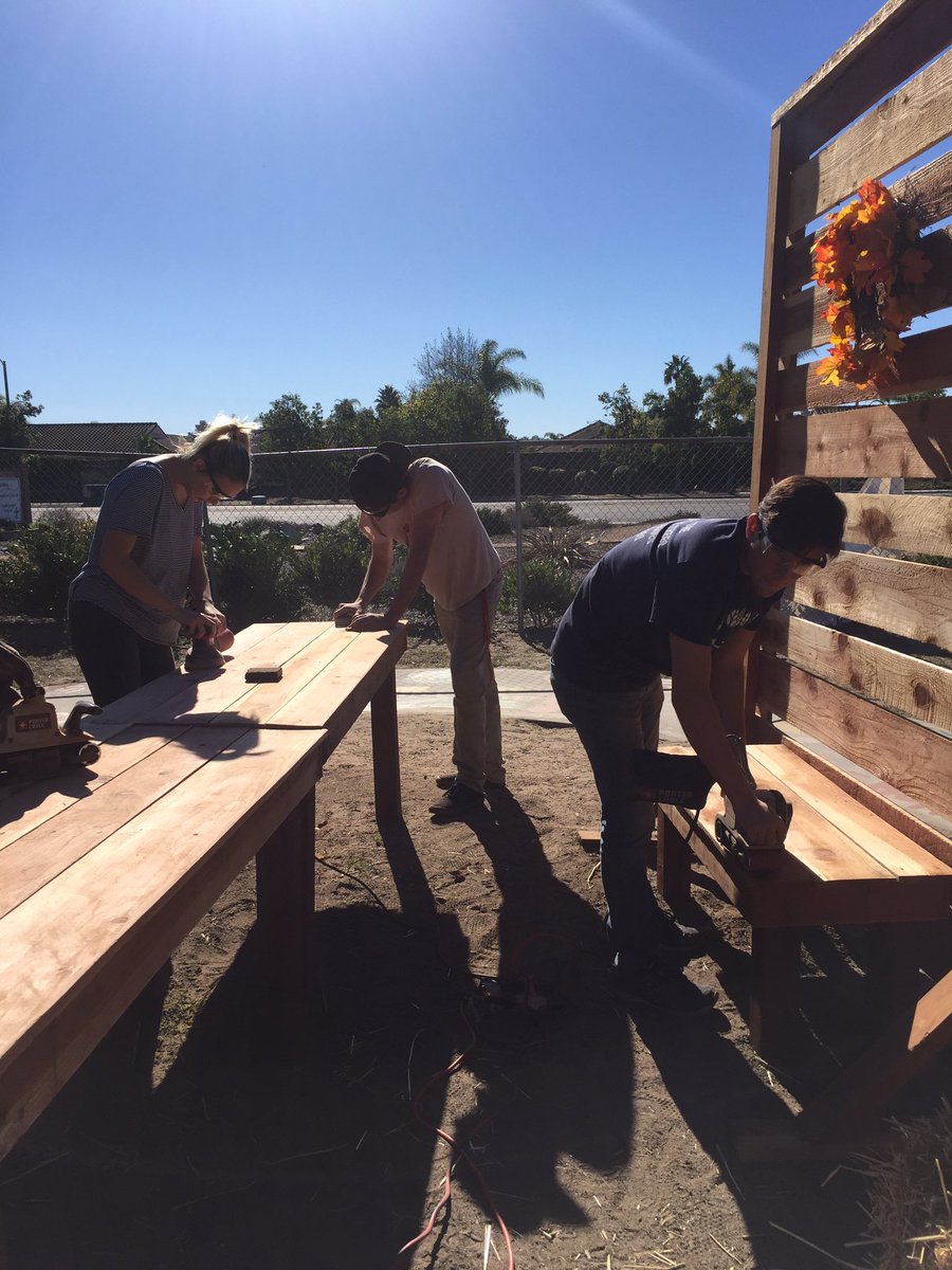 rbvtrees's tweet image. Environmental club sanding new benches and tables for children at the preschool for families under the poverty line 🌿🌻🔨