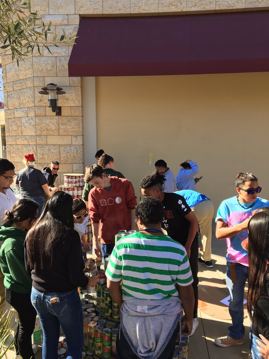RMHS_Chemistry's tweet photo. CIHS & RMHS students collaborating on building their can tree, giving back to the community #CANtree2016 #crushingit https://t.co/nMmQtHPM7j
