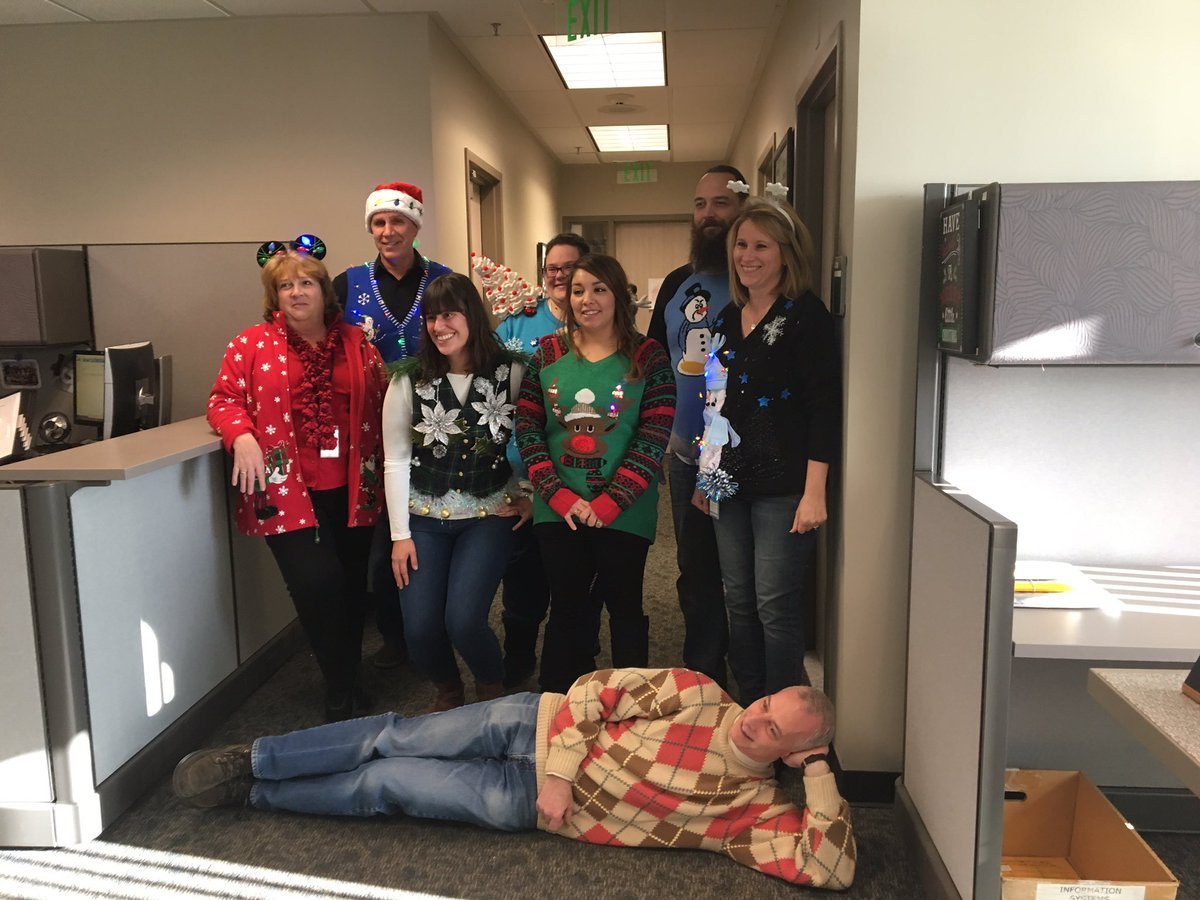PFlanagan2's tweet photo. Granite IS Department rocking the ugly sweaters. #UglySweaterContest #GraniteEdTech https://t.co/YsUZp96w46