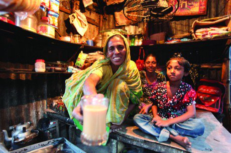UNDP's tweet image. Shyamola is 1 of world's 1 billion #migrants living in slums. Her story of hope: bit.ly/1mfvGPq #ForMigrants