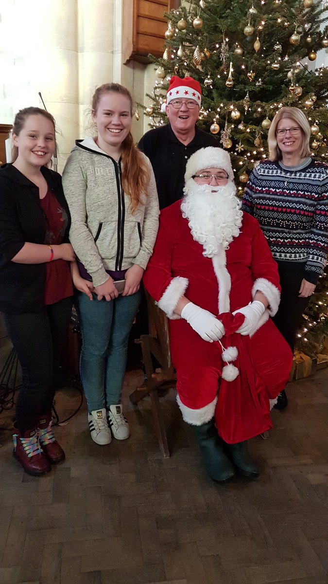 Santa in disguise as PO Kinealy with his helpers delivered gifts and had breakfast with the children at St Nicholas church Wallasey