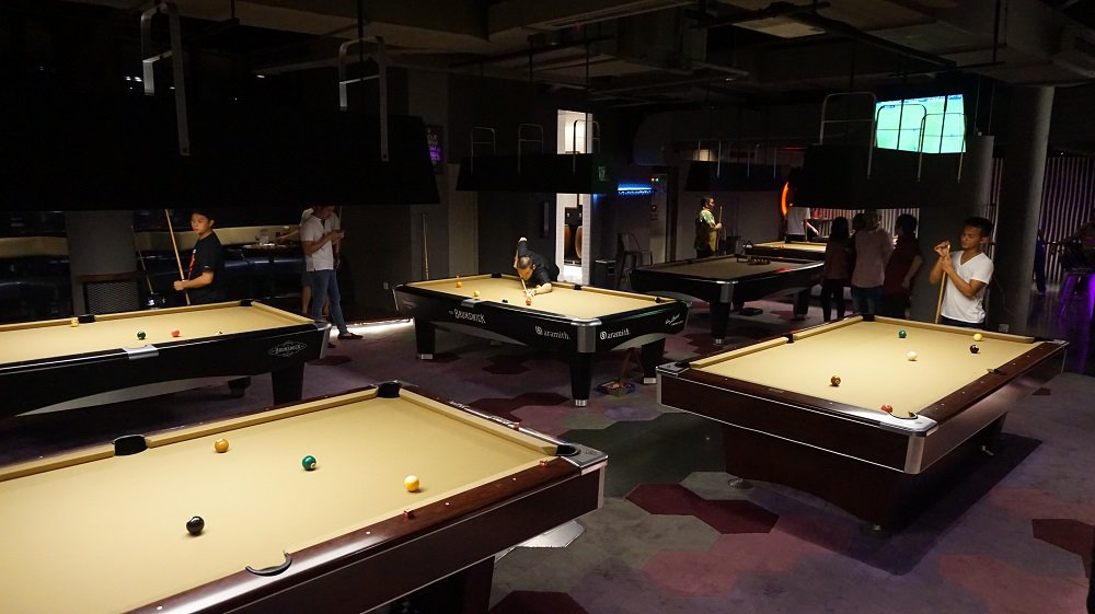 Expect a mix of novices and experts playing eight-ball and other variation of the game during busy nights out at The Breeze BSD #QBilliard
