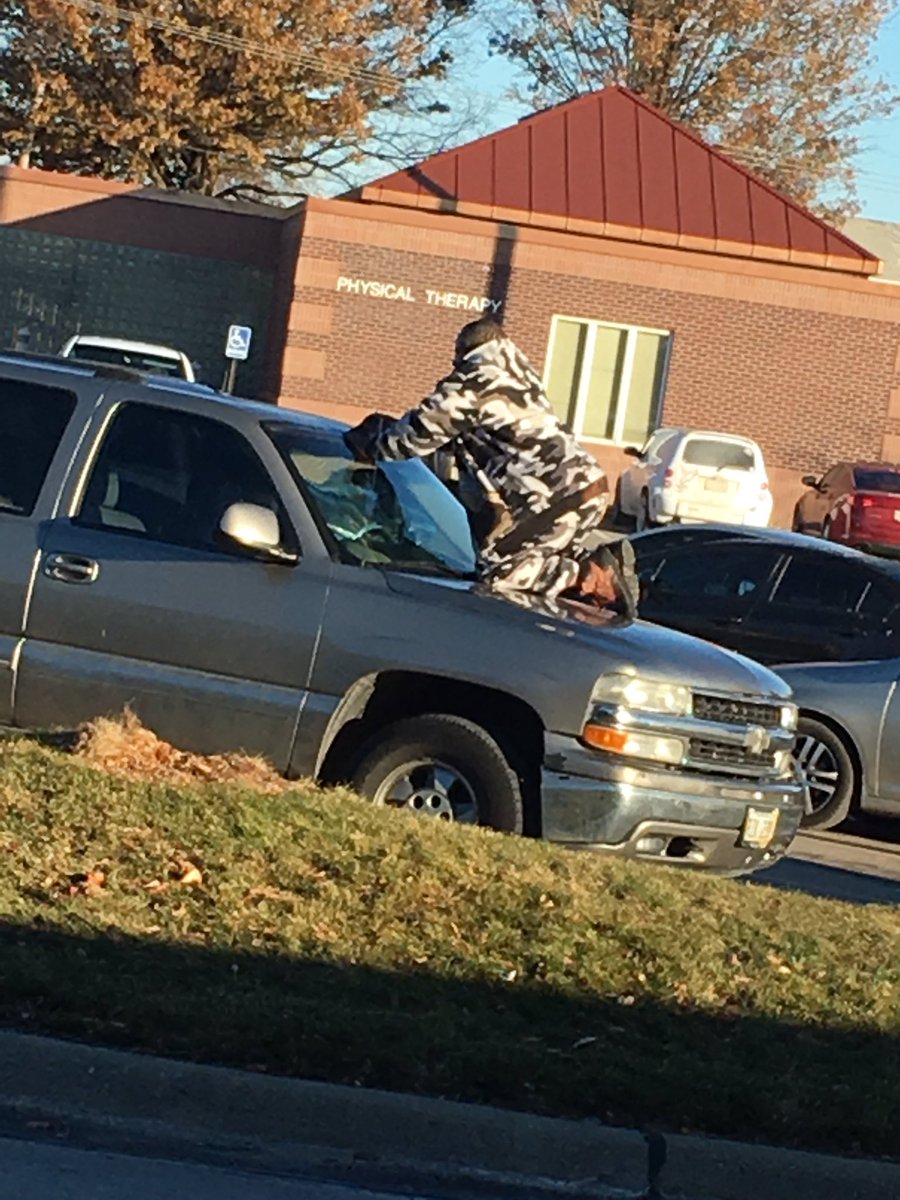 jmmesserschmidt's tweet photo. Meanwhile in South #Omaha black duct tape layers are being used as a *ingenious sun visor. #SunProbs https://t.co/9CmpJA2VYV