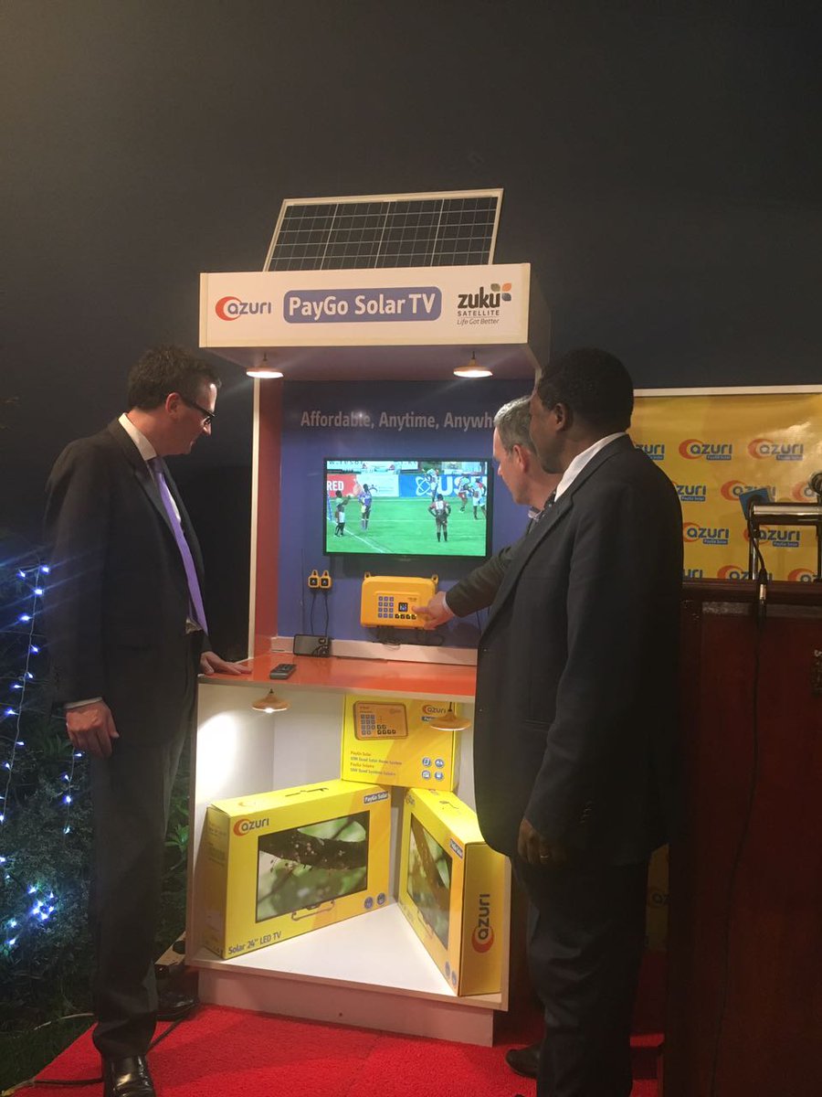 Azuri_Tech's tweet photo. @HCNicHailey, Azuri's CEO and Director of Renewable Energy, Eng. Isaac Kiva with the first complete #PayGo satellite TV package #AzuriTV https://t.co/6sVnRaALMg