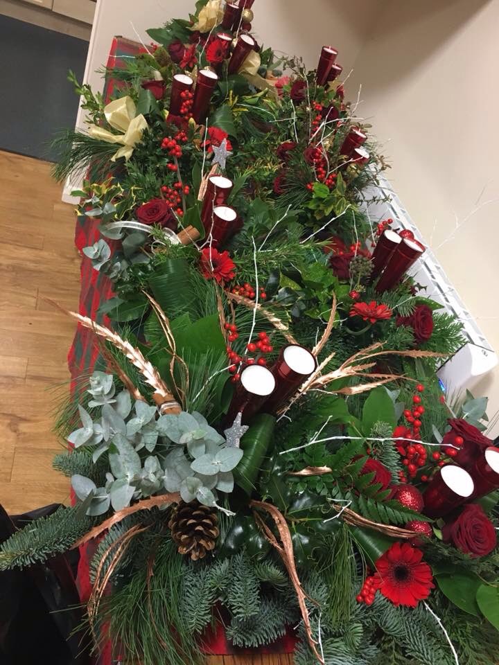 Amazing table centres created by our lovely ladies this evening with a little guidance from Madeleine Bradley flower designs #FestiveFun 🎄