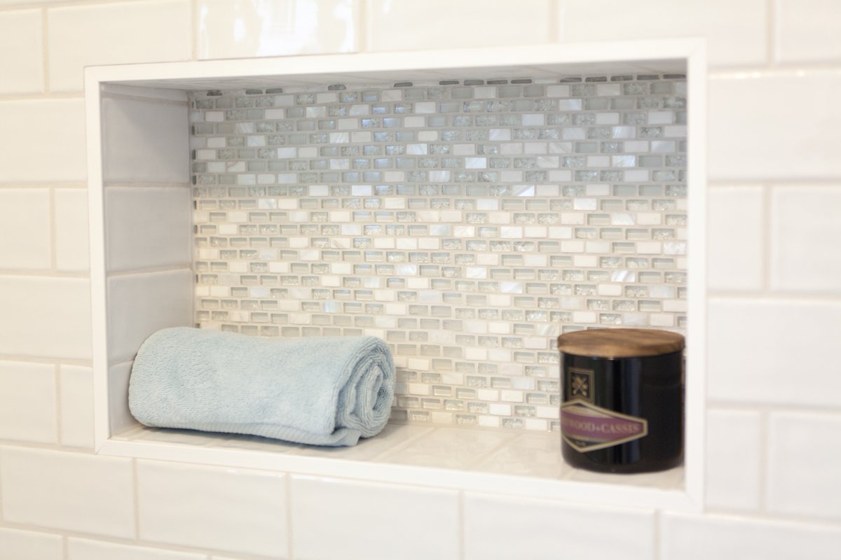 Don't build a shower without a spot for your necessities! #yeginteriordesign #don'tgonicheless