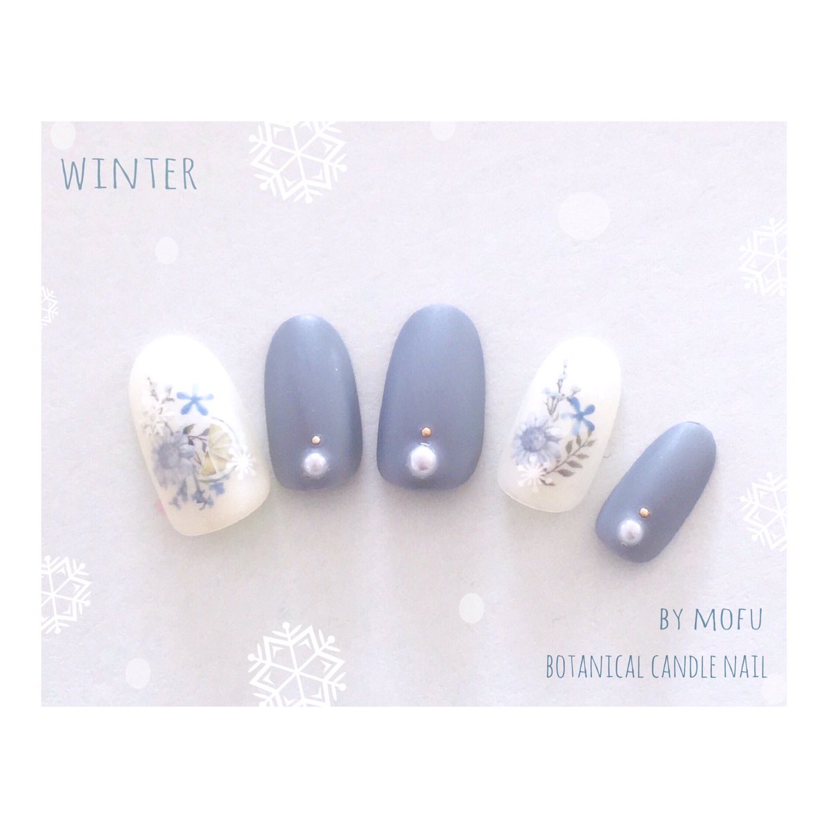 もふnail 四季のボタニカルキャンドルネイル 冬 四部作最後の冬 青系のお花達を集めて 雪の結晶を一緒に閉じ込めました ミ ミ やっつけすぎてスタッズの位置とかすごいズレてるけど気にしないでください 冬ネイル ボタニカル