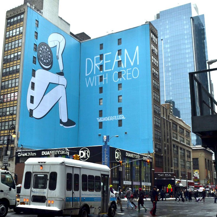 Envelop's tweet image. NYC wonderfilled by this impressive version of the sweet and tender drawing #GeoffMcFetridge did for the 2015 'Play With #Oreo' campaign.