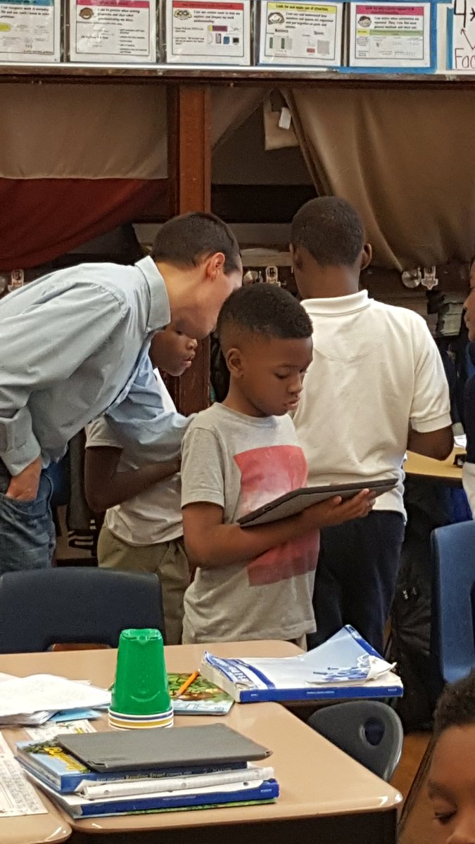 @tiltoncoses.....Mr Vinnie assisting 4th grade students during hour of code.