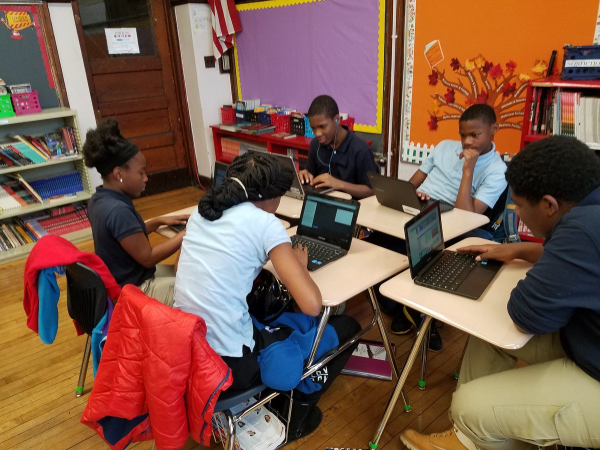 The future Scholars from room 301 are perfecting their Coding