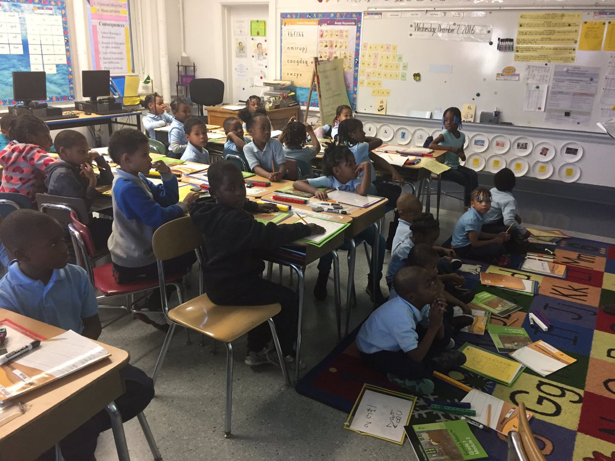 BES2012LLC's tweet photo. It's almost 2:45 and our students are focused on their math teacher, a fellow 1st grader! @DCPS_Math @ward8edcouncil @dcpscluster1 https://t.co/6ZX9R10Hqa