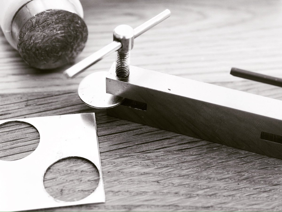 A little behind the scene peek at how I hand cut, shape, file and polish my circle pendants....I better get back to it!!