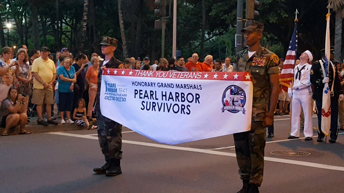 EVYM's YM's GYSGT Henry and PVT Burt have the opening Banner they led the 75th Anniversary Parade in Honolulu.