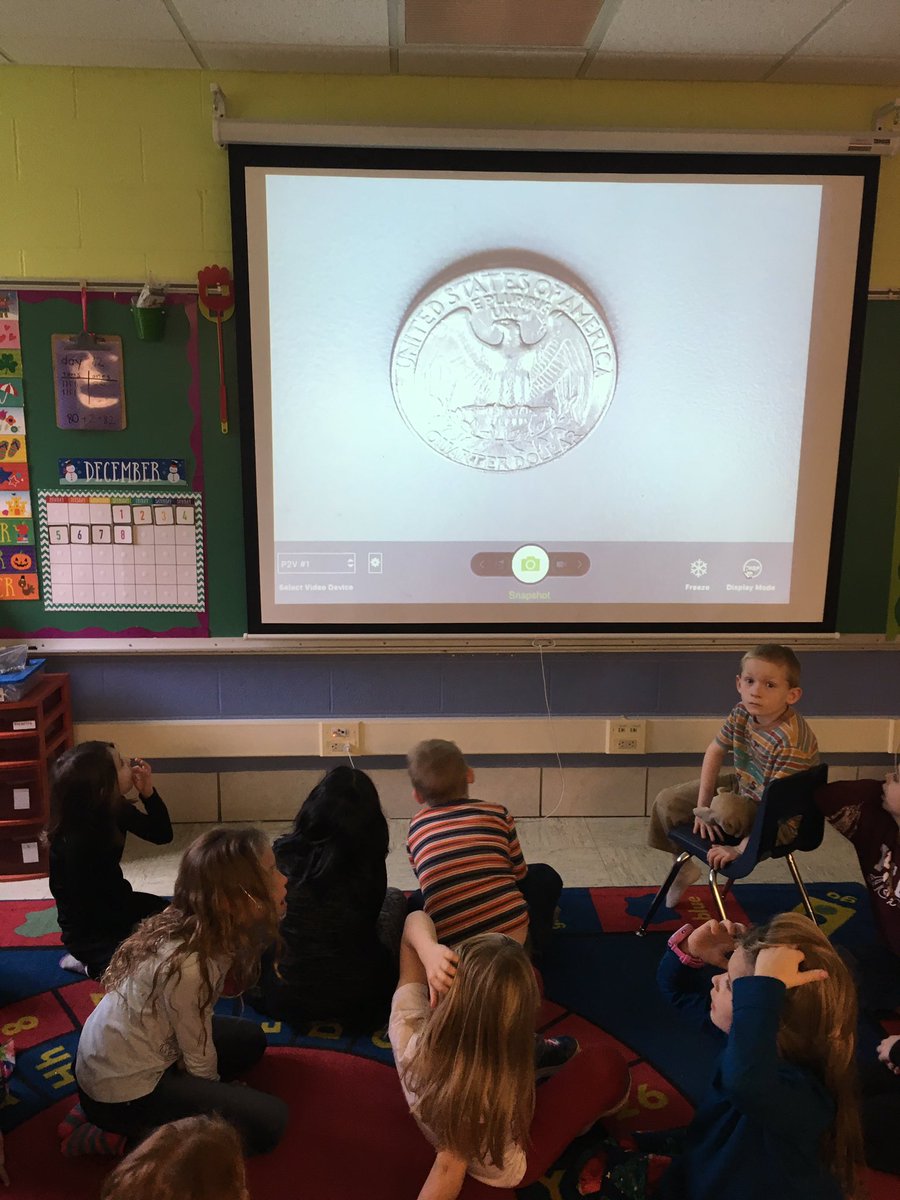 findinginfirst's tweet image. We are so thankful for our document camera! It helped us examine money up close for math. #learningwithtechnology
