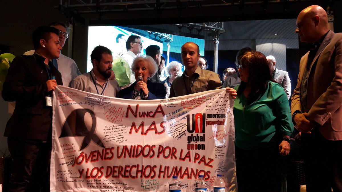 Gustavo Triani (@trianigustavo) on Twitter photo Los jóvenes de <a href="/uniamericas/">UNI Américas</a> entregan una bandera a la titular de Abuelas de Plaza de Mayo, Estela de Carloto <a href="/arosenzvaig/">Adriana Rosenzvaig</a> <a href="/UNIAmericayouth/">UNIAmericayouth</a> Los jóvenes de <a href="/uniamericas/">UNI Américas</a> entregan una bandera a la titular de Abuelas de Plaza de Mayo, Estela de Carloto <a href="/arosenzvaig/">Adriana Rosenzvaig</a> <a href="/UNIAmericayouth/">UNIAmericayouth</a>
