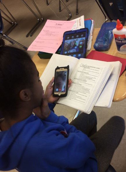 SGMS_Writers's tweet photo. Facetiming with an absent student to complete a partner paper on #freewritefriday.   Kids these days...smh. https://t.co/s27xEySbMi
