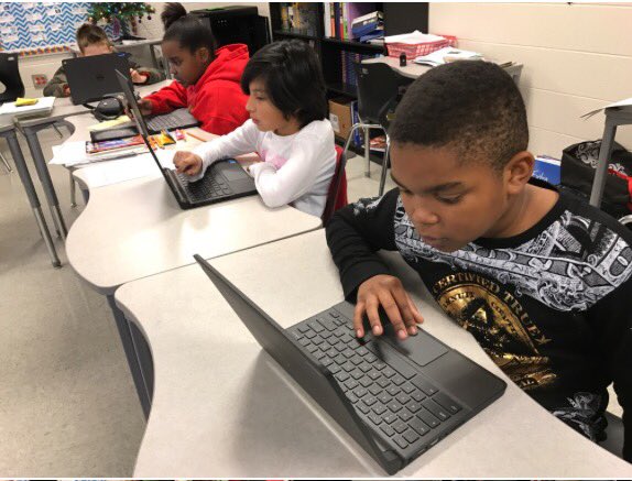 vlferrari's tweet image. @RCSWolvesPLN Mrs. Belyeu&apos;s 4th grade class enjoys their Hour of Code! #RCSHourofCode #HourofCode #RCSWokvesPLN #TeachRCS