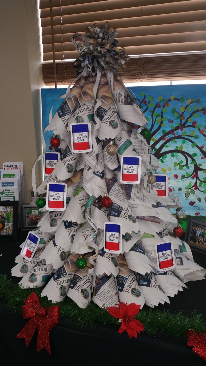 Check out our upcycled Christmas Tree we made from recycled @LewisvilleTexan newspapers! #ReduseReuseRecycle
