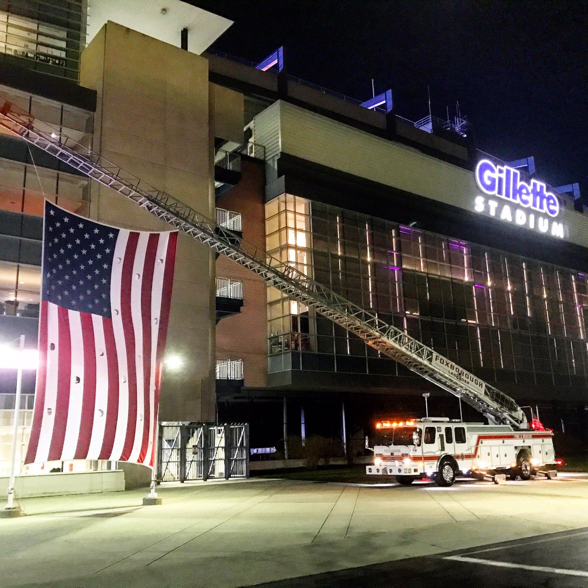 FoxboroughFire's tweet photo. FFD Ladder 26 displaying the colors this evening @GilletteStadium for the @MAFallenHeroes Gold Star Family Dinner https://t.co/WGed8NgSU4