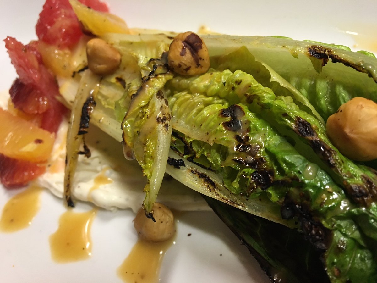 Holiday Salad: Grilled Romaine Heart, Brulleed Grapefruit Vinaigrette, Citrus Segments, Peppercorn Mascarpone, &amp; Hazelnuts. #avlrad #avleats