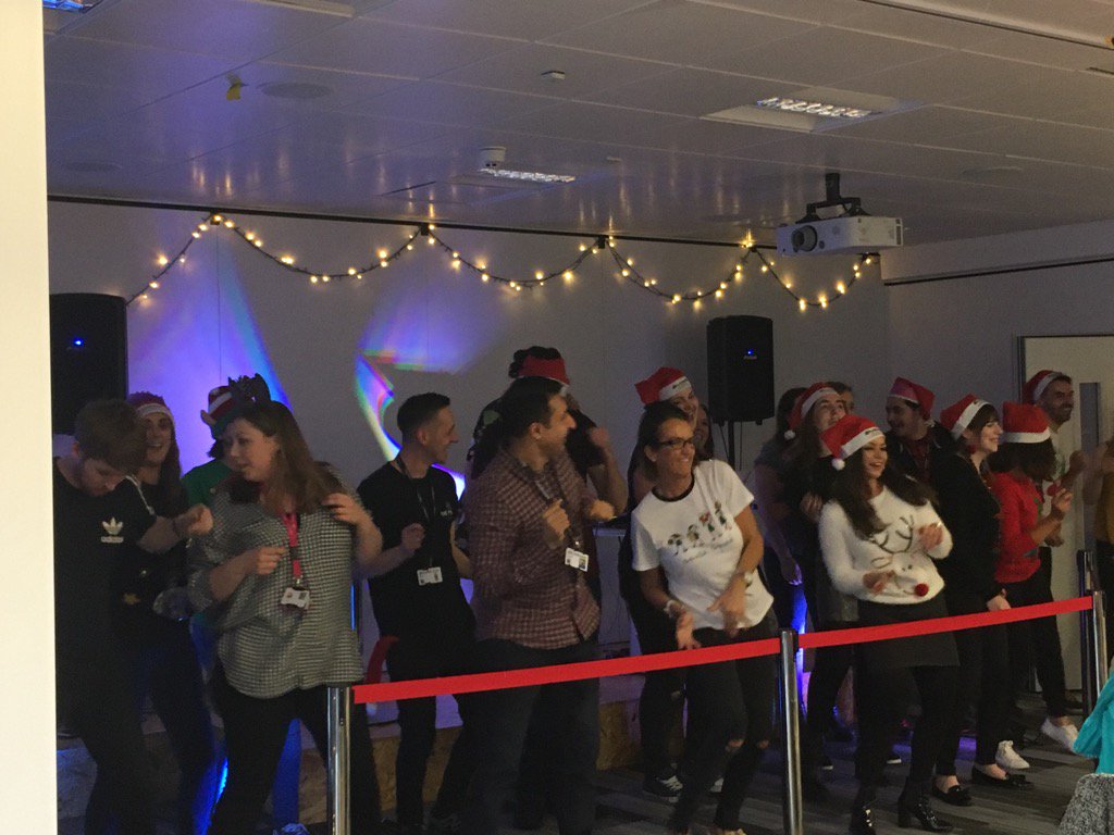 Staff volunteers from @AutoTraderLife performing for guests.