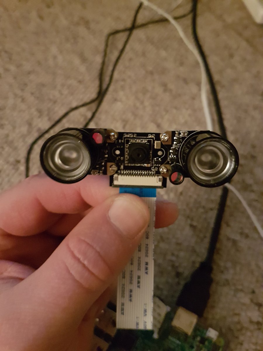 BedeComp's tweet image. An IR camera with a pair of IR LEDs bolted on. The lights might be off but #raspberrypi club will be on. #codinginthedark #compsci #coding