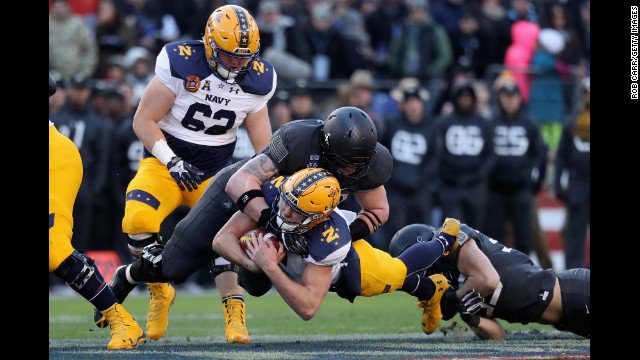 Army defeats Navy 21-17 in the annual college football match-up. The victory ends Navy's 14-year winning streak. cnn.it/2hyw37k