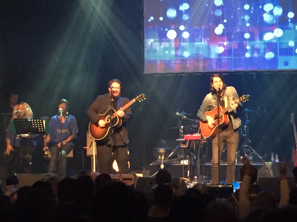 Closeup of <a href="/bobbybazini/">Bobby Bazini</a> playing &amp; singing at #AndyKimChristmas
