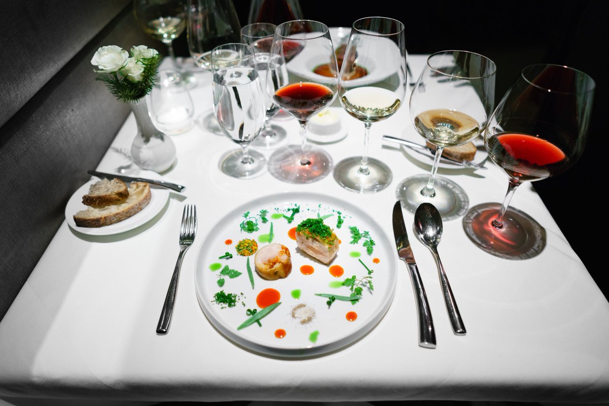 Next, Chicago - Storey Farms Chicken, red pepper reduction, confit biyaldi and fines herbes; rabbit "saddle," applewood-smoked bacon