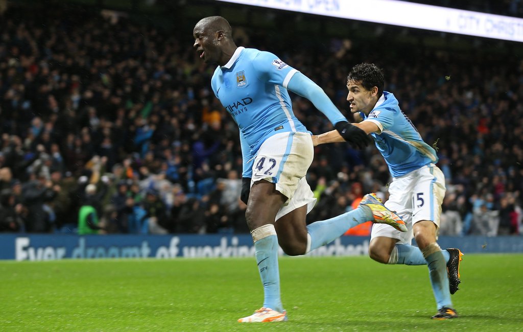 ManCity's tweet image. #onthisday last year @YayaToure's 92nd minute strike stole the points against Swansea. #mcfc