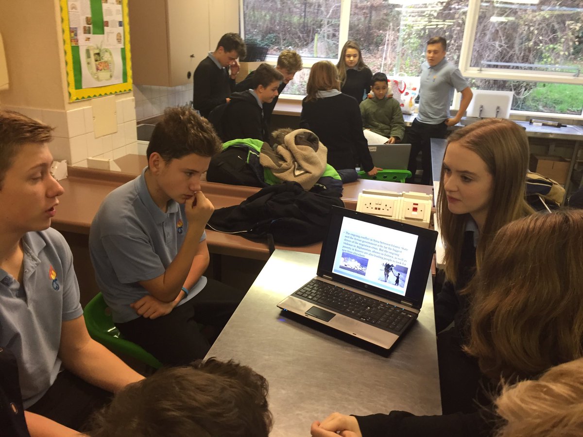 mcswelshbacc's tweet photo. Year 7 students evaluating Year 10 students' methods for raising awareness for the Refugee Crisis @LearnWithMCS @MCS_Year_9 https://t.co/8c5GMRTQcQ