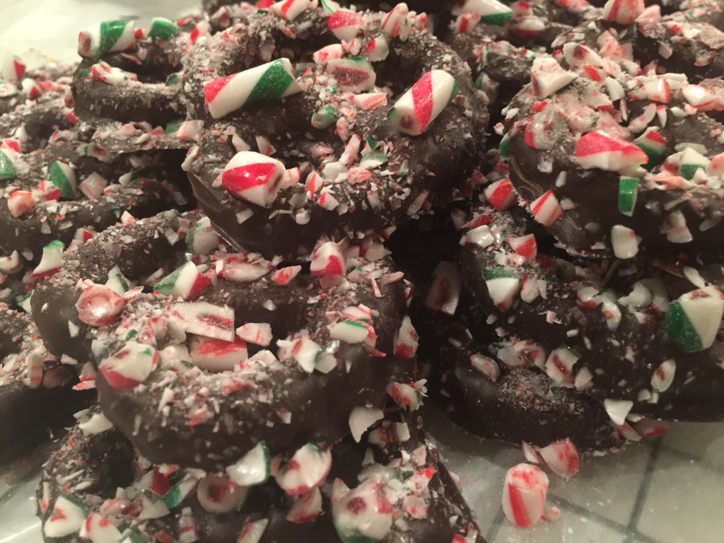 munchiemaker's tweet photo. Chocolate dipped Peppermint candy cane pretzel!  @munchiemaker https://t.co/QiPP4VwxAG