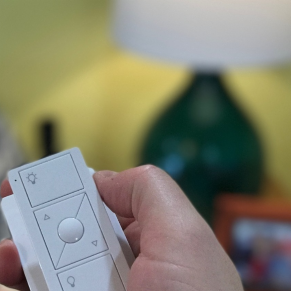 Lutron's tweet photo. .@daddysweeney loves using his Caséta Wireless &amp; Pico remote to set family movie night w/ the kids. #OurLifeUpgrade https://t.co/X0zSlqLfPO https://t.co/AWBbzAizQk