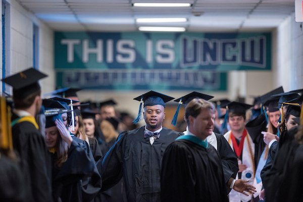 UNCWilmington's tweet photo. Congratulations to our newest #UNCW alumni! View more images from Fall Commencement at https://t.co/r1ZAlsxjo6 #UNCW2016 https://t.co/DWpvRZSrWn