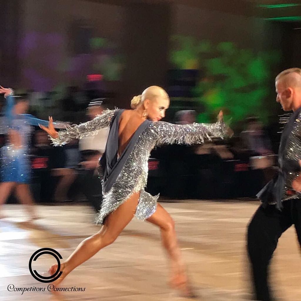 ProAmConnection's tweet image. The beautiful Olena Shvets-Nikishkin dancing Samba with Dmitry Nikishkin at #holidaydancec… ift.tt/2hmrU78