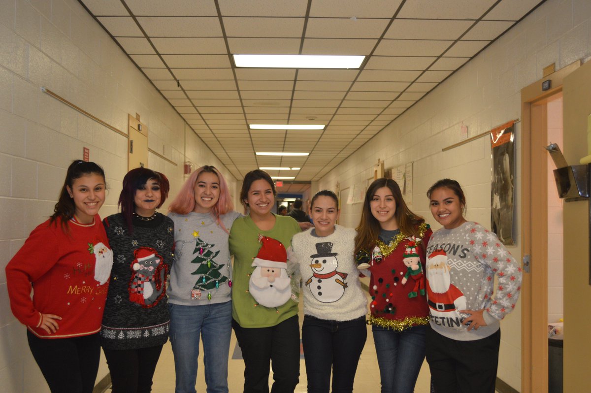 socorro_nhs's tweet photo. NHS Ugly Christmas Sweater Meeting was a total sucess and around 100 gifts were wrapped for toys for tots https://t.co/pBucxgO0J0