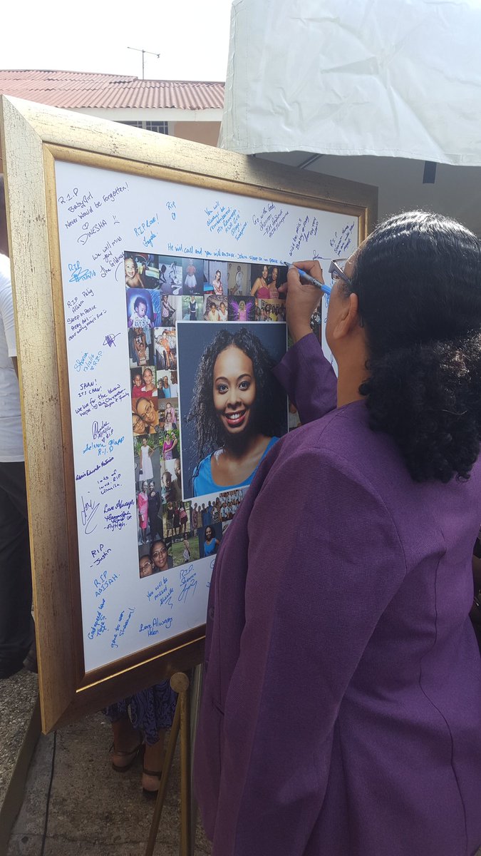 tv6tnt's tweet image. Mourners write condolences at the funeral of Shannon Banfield