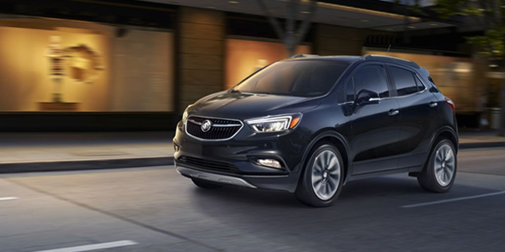 Buick's tweet image. Sidewalks dressed in holiday style are the perfect complement to the new #BuickEncore.