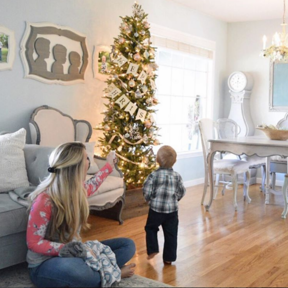 Lutron's tweet photo. .@Momtiquetweets uses her Caséta Wireless to turn on her #xmastree from the comfort of her own bed. #OurLifeUpgrade https://t.co/X0zSlr2Reo https://t.co/rz0P0Ex2w4